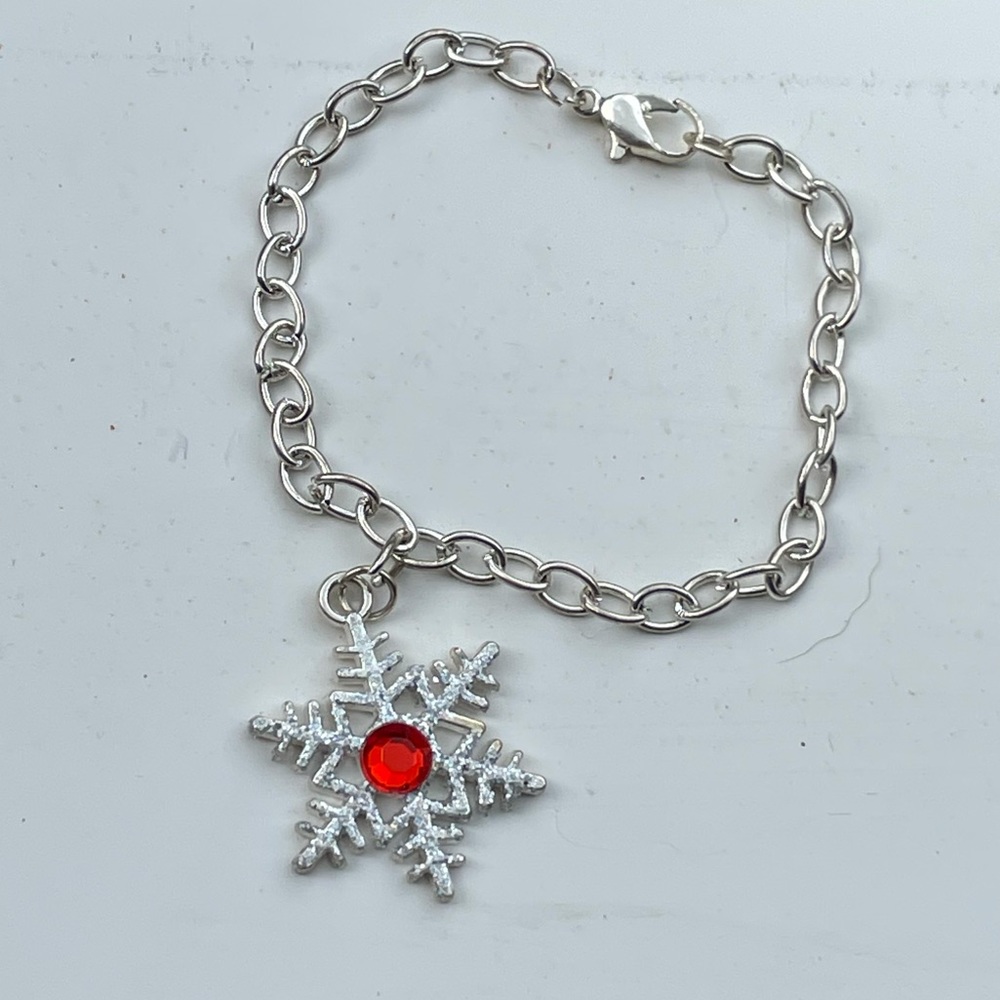 Snowflake Charm bracelet with red gem